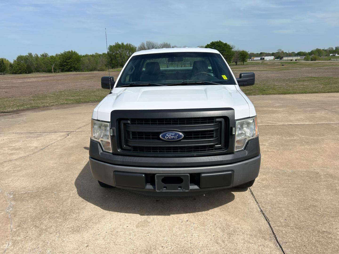 2014 White /Gray Ford F-150 (1FTMF1CM5EK) with an 3.7L V6 DOHC 24V engine, 6-Speed Automatic transmission, located at 17760 Hwy 62, Morris, OK, 74445, (918) 733-4887, 35.609104, -95.877060 - 2014 FORD F-150 XL 6.5-ft. BED HAS A 3.7L V6 ENGINGE, 2WD BI-FUEL (RUNS ON BOTH CNG OR GASOLINE) FEATURES MANUAL WINDOWS, MANUAL LOCKS, MANUAL MIRRORS, AM/FM STEREO, SIRIUS RADIO, CD PLAYER, AUXILLIARY PORT, CRUISE CONTROL, TRACTION CONTROL, MULTI-FUNCTIONING STEERING WHEEL CONTROLS, BEDLINER. IT RU - Photo#1